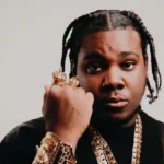 Byron Messia Biography